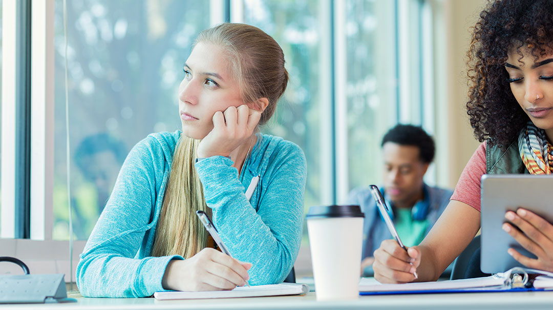 desktop_Bored-college-student-daydreams-in-class_GettyImages-627739700