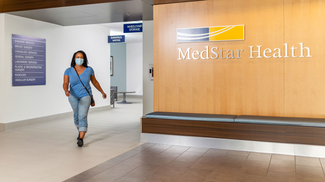 Woman walking through MedStar Health Facility