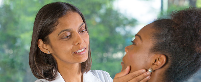 Female doctor examining pituitary gland of patient