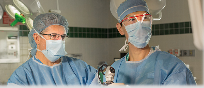 Surgeons performing pituitary surgery