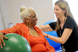 Therapist with patient at the Inpatient Rehabilitation Center at MedStar Good Samaritan Hospital