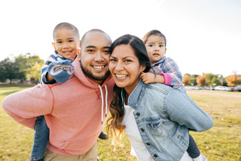 young parents with two children