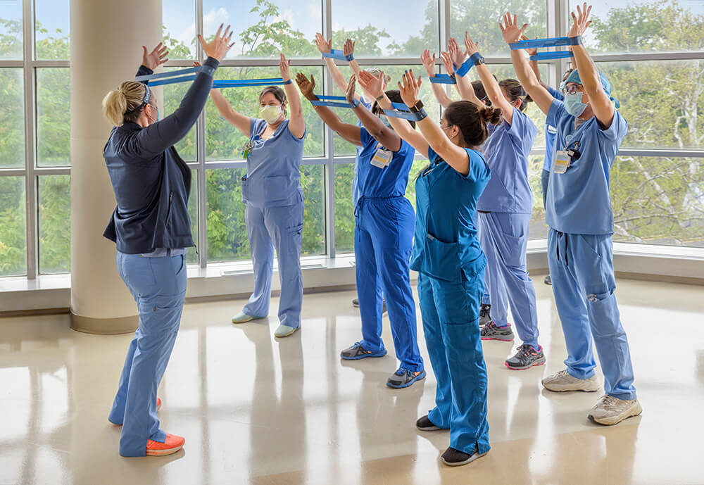 A group of medical practitioners jumping for joy