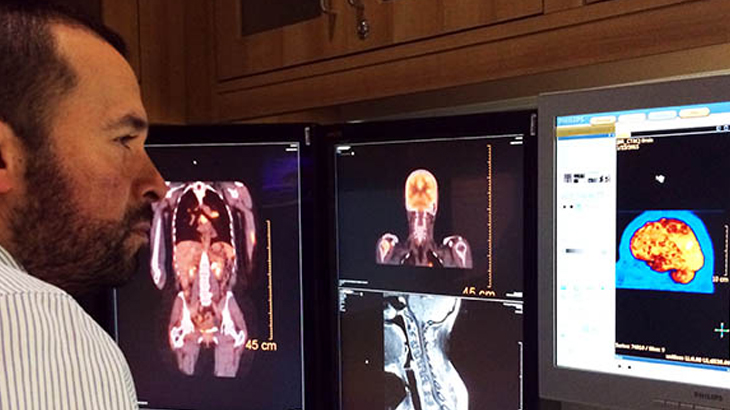 Doctor examining digital x ray