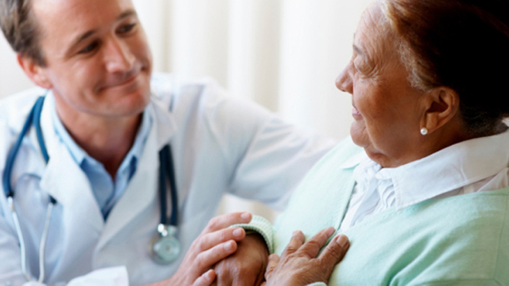 Doctor taking care of senior patient