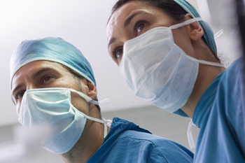 Image of healthcare professionals during a liver transplant surgery