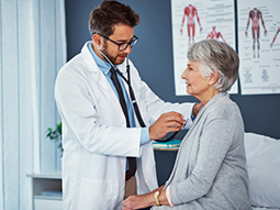 Doctor examining patient