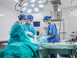 Team of surgeons in operating room at a hospital