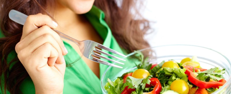 woman eating healthy salad