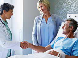 Bariatrics specialist shaking hands with patient after the surgery