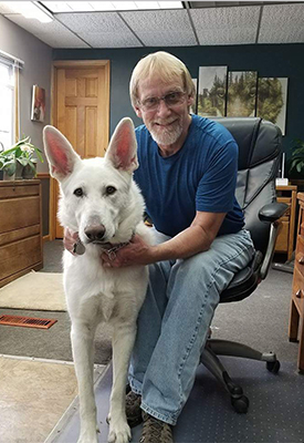 Donor, Simmont with his white shepherd