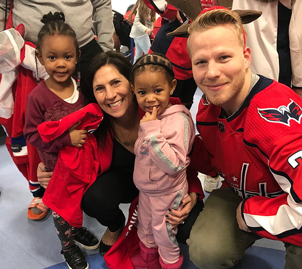 Washington_Capitals_Lars_Eller_and_Hope_for_Henry_Founder_CEO_Laurie_Strongin_with_patients